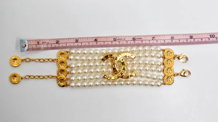 Bracelets Vintage by Misty Chanel Gold Plated CC Button Detail 6Strand Pearl Bracelet