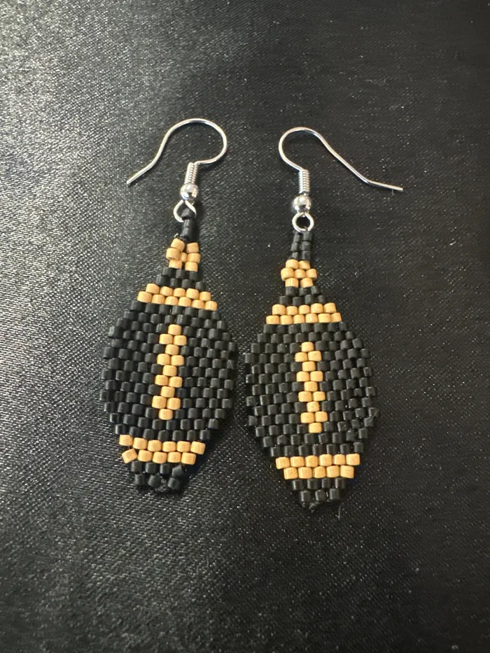 Beaded Football Earrings Chris Crosbys Purple Coyote Earrings